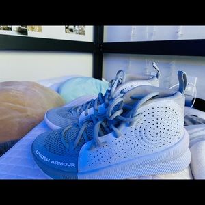 Under armor grey and white basketball shoes